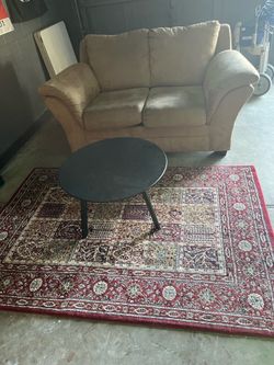 Couch, rug and table