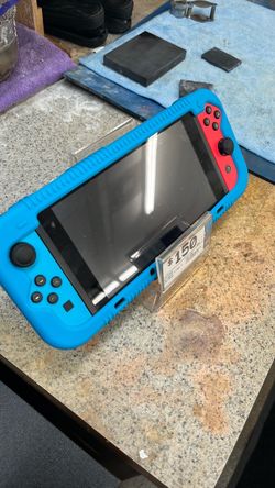 Nintendo Switch with Blue Silicone Case