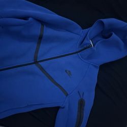 Blue Nike tech size S