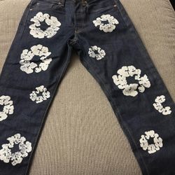 Denim tear dark blue jeans