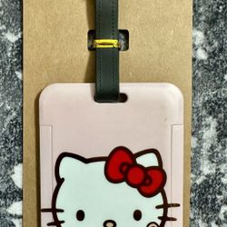 New In Bag/ PINK HELLO KITTY/ Luggage, And Bag Tag. You Can Also Put This On Anything Else You’d Like.