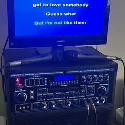 Vocal pro Karaoke machine with  2 mics and over 100 CD’s