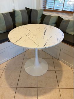 Marble style tulip dining table