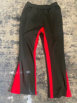 Red and black pants with red stripes on the Side Size Medium
