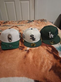 2 new era hats and a belica hats.