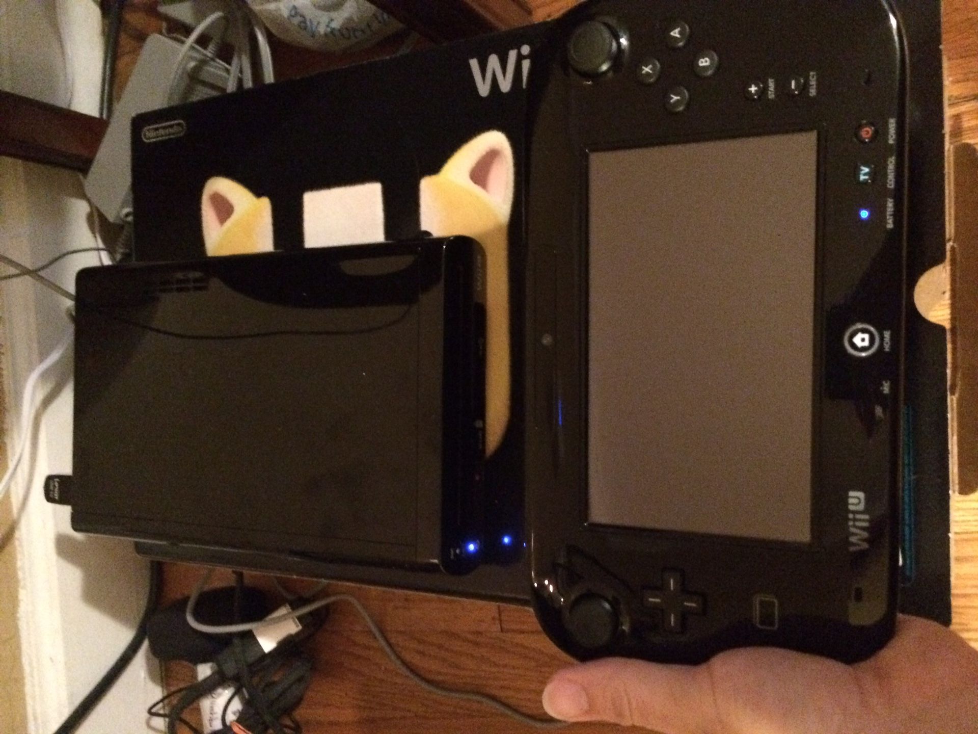 Modded Black 32gb Wii U with 64gb extra flash drive, comes with everything plus 24 of the best Wii U games, 3500 Nintendo, Super Nintendo, sega Genes