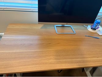 Adjustable height desk with monitor