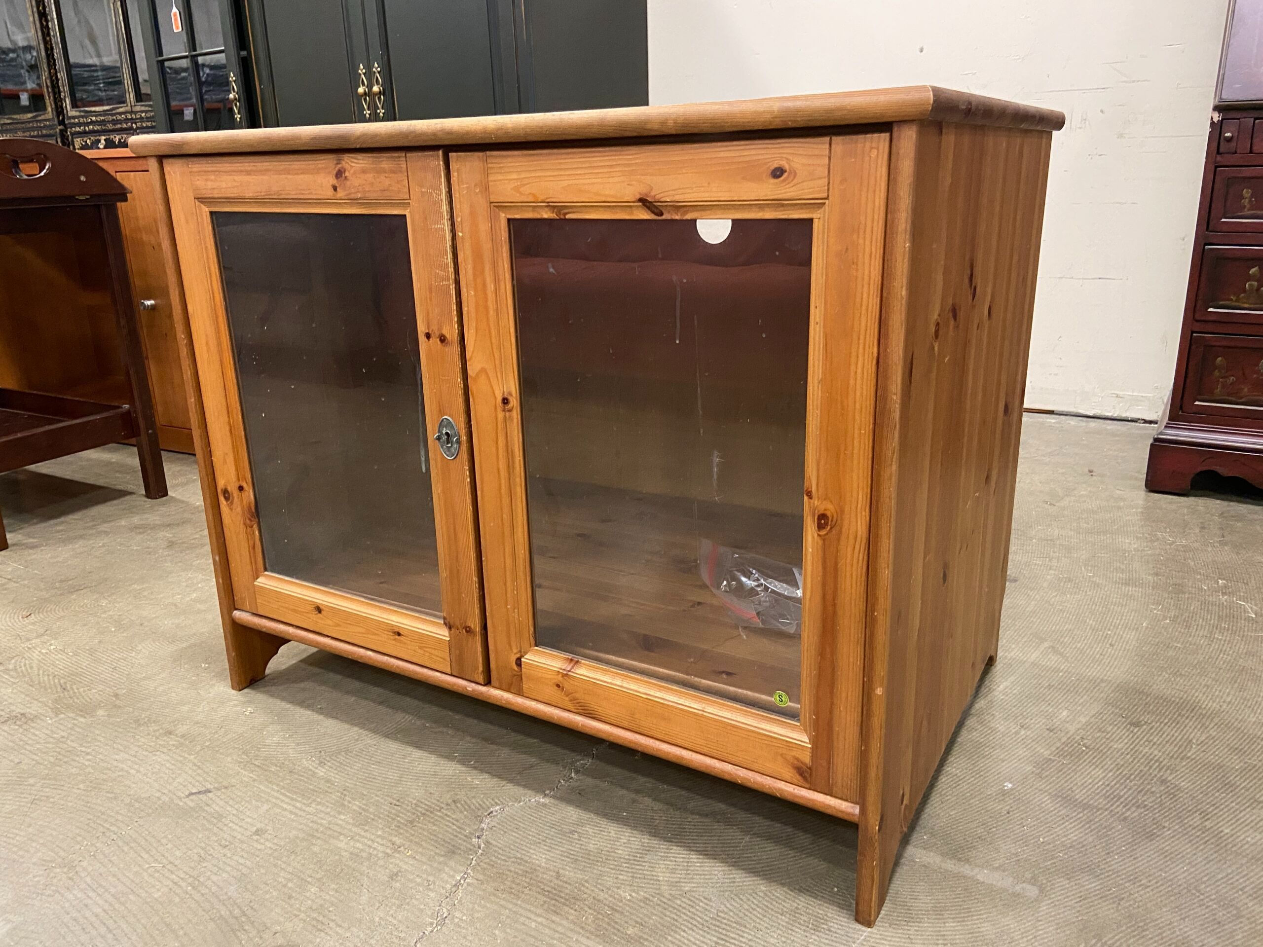 Wooden TV Stand with Shelving and Glass Doors