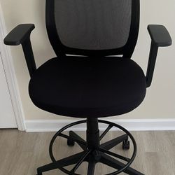 Black Swivel Chair for adjustable height work desks, drafting tables.