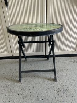 Small glass metal foldable patio porch outside outdoor table
