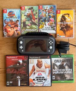 Nintendo switch lite  with all games that you see here all tested and working.