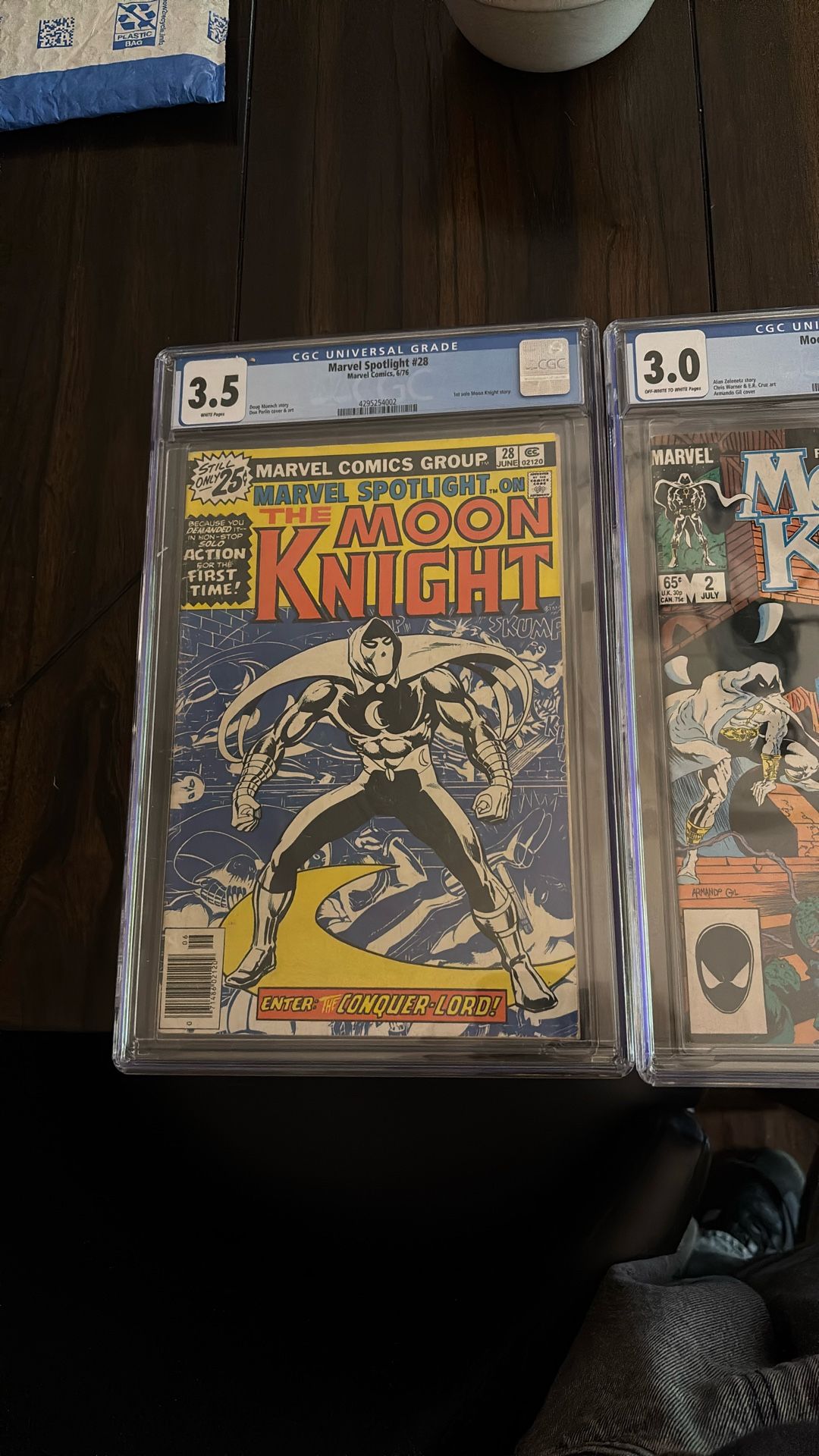 3 Graded Comics Marvel Spotlight 28 Graded 3.5 And Moon Knight #2 Graded 3.0 And The Walking Dead Issue One Graded 9.8