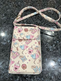 Disney Mickey Mouse "Magic" sweet treats phone crossbody purse features a repeating pattern of pastel treats and snacks. Brand new never used. Smoke
