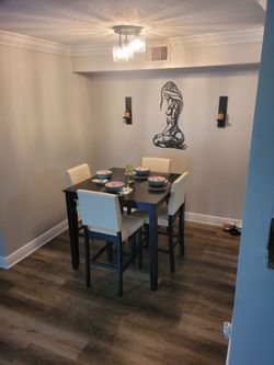 Rooms to go leather dining room table and chairs