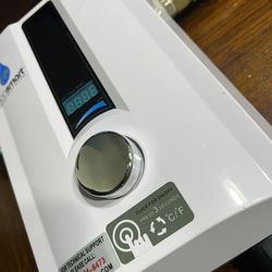 Tankless Water Heater And Extras (Wire, Pipes, Fittings)