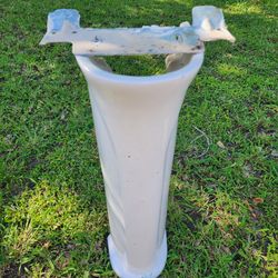 Porcelain standing bathroom sink.