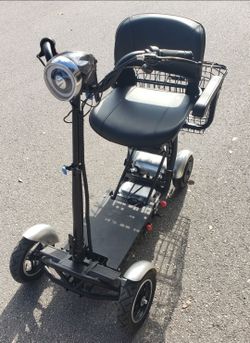 4 Wheel Electric Mobile Scooter - 25 Mile On Full Charge
