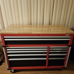 52" Milwaukee read tool storage toolbox with electrical outlets.
