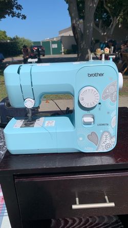 Brother sewing Machine  with rolling case