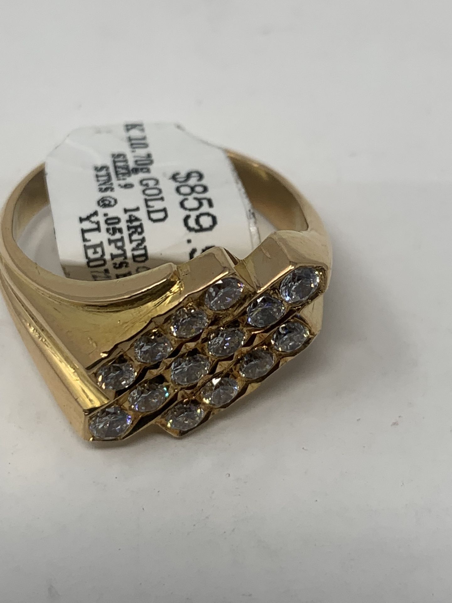 22 karat yellow gold ring with 10.70 gram of gold  with Cz store. in excellent condition  size 9. Check for availability Open From 9 am to 7 pm   Mon 