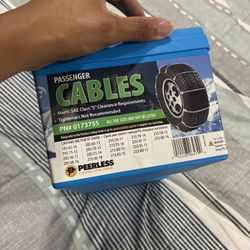 UNOPENED SNOW CHAINS 