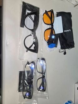 4 pairs of glasses