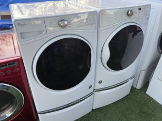 Whirlpool Front Load Washer And Electric Dryer On Pedestals