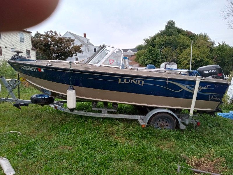1999 Lund 16 foot fishing slash leisure Boat
