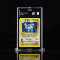 1999 Pokémon 1st Edition Machamp Holo #8/102 — TAG 8 NM/MT
