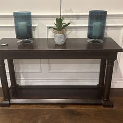 Brown Consol Table In Acceptable Condition. 