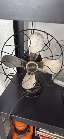 Antique metal fan