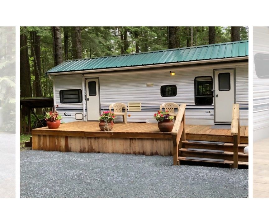 Camping Lot With Camp Trailer And Shed