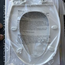 New Glacier Bay Plastic Elongated Toilet Seat