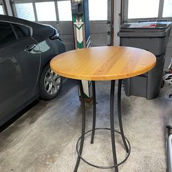 Pub table, wood and metal.  30” diameter, 41” high