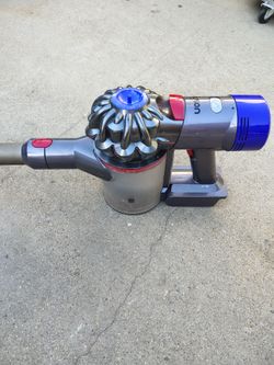Dyson V8 Animal with accessories and Milwaukee battery adapter