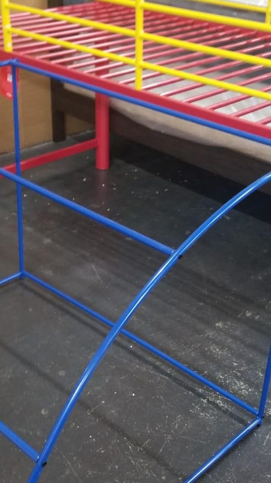 Kids loft bed with a slide and a tent