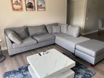 L Shaped Grey Sectional with matching ottoman and 2 sectional pillows