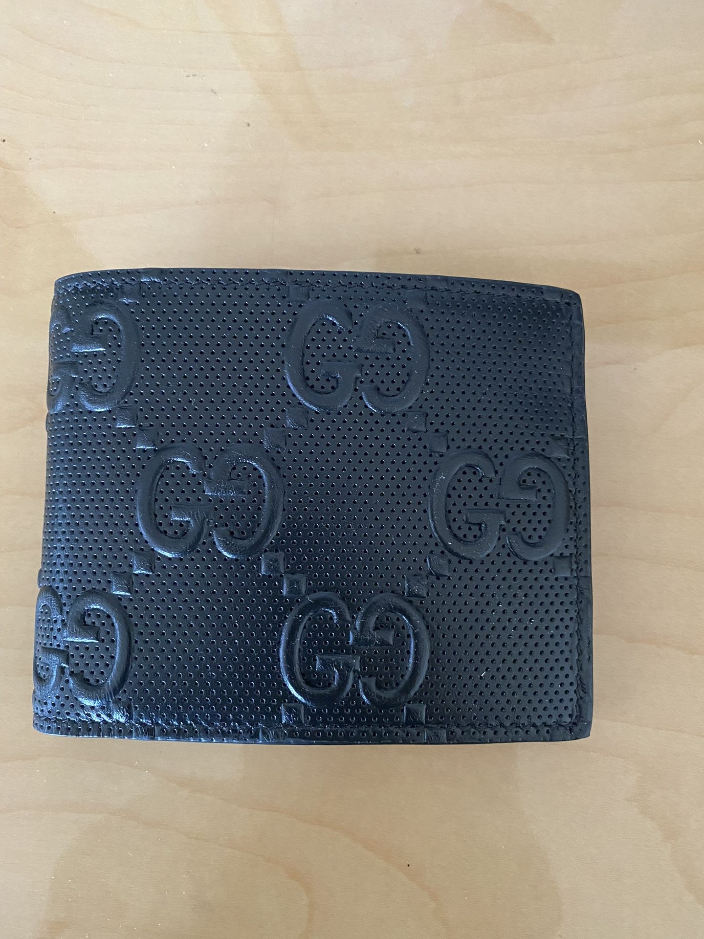 Gucci Embossed Bi-Fold Wallet