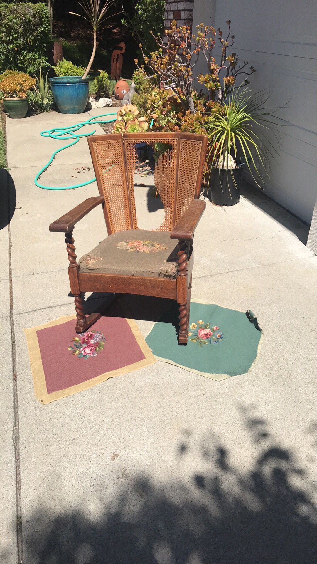 Mission style cane back/needlepoint rocking chair. Stickley Brothers Furniture Company (1906-1954).