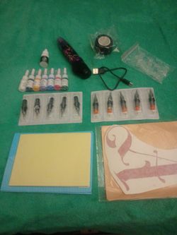 Brand new tattoo gun and tattooing kit