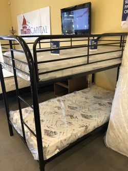 Bunk bed with mattresses