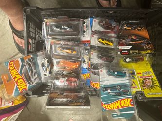 Hundreds of hot wheels and other die-cast cars and trucks