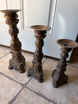 3 heavy candle holders
