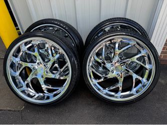 24x9 and 24x11 chrome Esko wheels