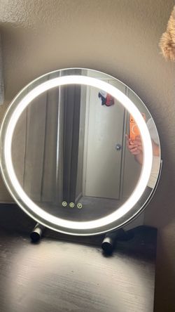 Mirror with light