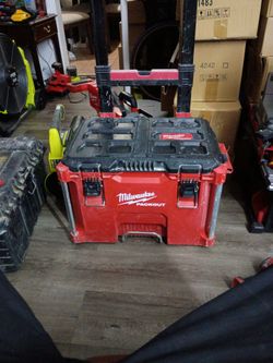 Milwaukee pack out rolling box good tires a little dusty but in good shape