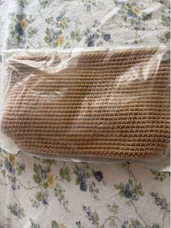 The Sak makeup bag