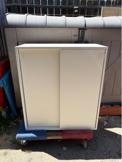 White Cabinet With Sliding Doors