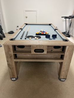 Swivel Table brings three full-size games—air hockey, billiards, and table tennis—into one stylish, space-saving design.