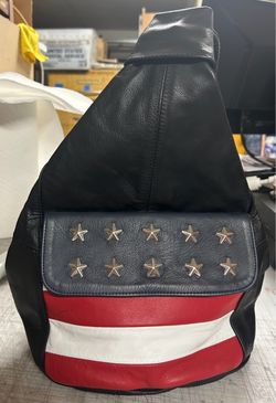Purse/body cross .. excellent condition $50.00  firm